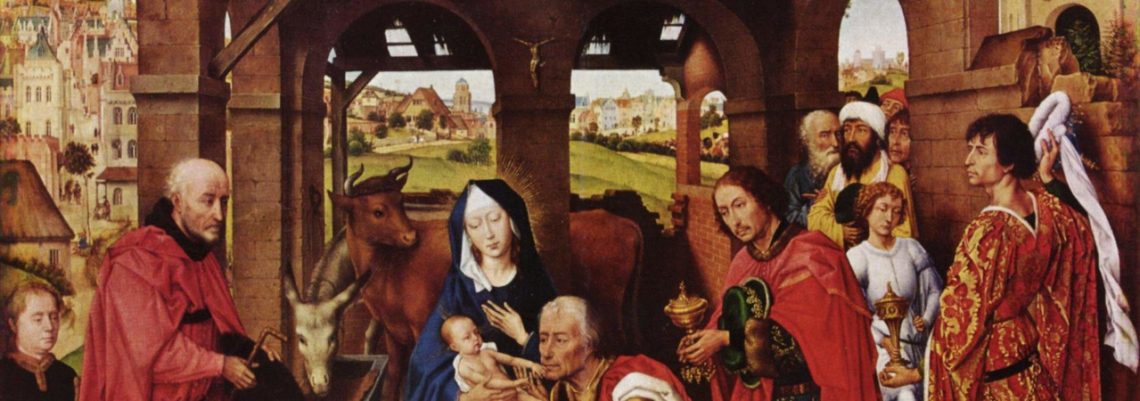 Eine Darstellung der Krippe mit Kruzifix an der Wand.